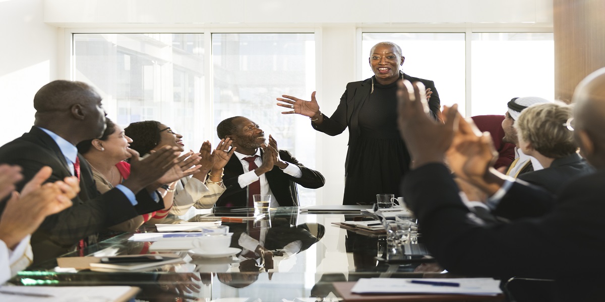 Bald Black Woman Business meeting
